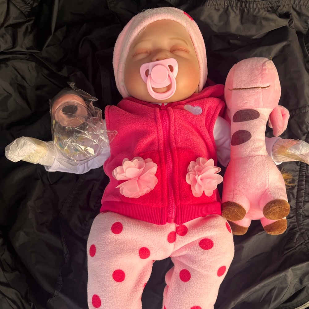 CHAREX realistic reborn baby doll 22 inches new. My daughter wasn’t a fan lol.